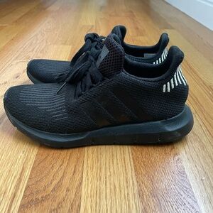Black Adidas sneakers